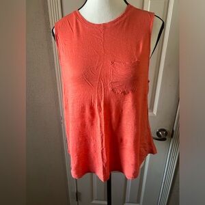 Sleeveless orange top